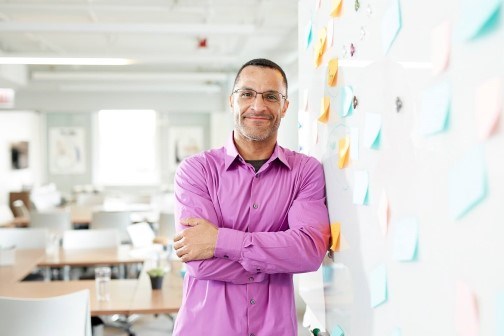 Man with Quartet Whiteboard in an office